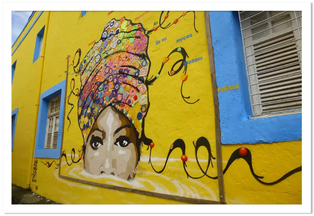 Tableau street art d'un graffiti sur un mur jaune à Olinda